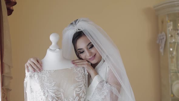 Beautiful and Lovely Bride in Night Gown and Veil. Wedding Dress. Slow Motion