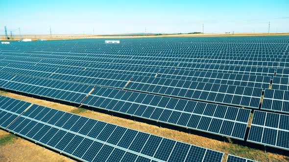 Solar Power, Solar Panel, Solar Farm Concept. Blue Solar Panels Set Up in a Large Field