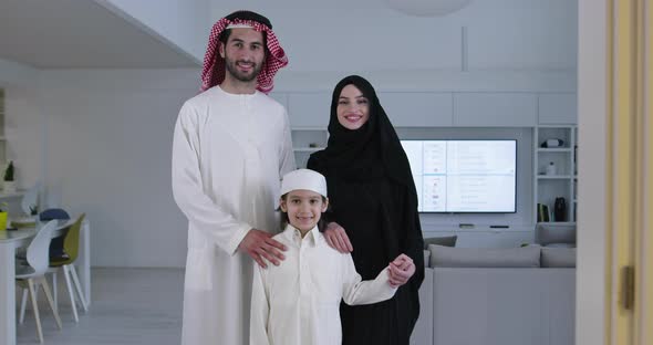 Muslim Family with Kid in Modern Home