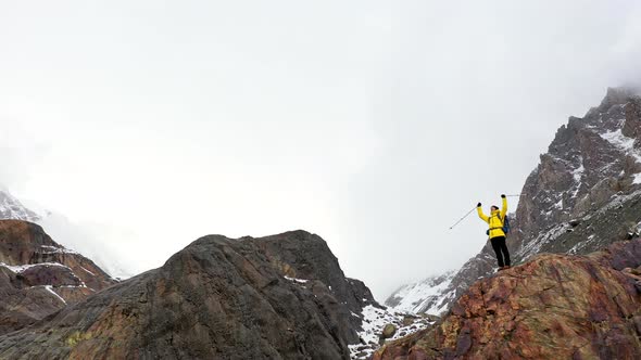 Young Hiker On Mountain Peak At Sunset Successful Pose Outstretched Arms Business Life Achievement