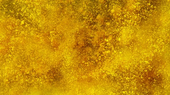 Super Slowmotion Shot of Yellow Powder Explosion at 1000Fps