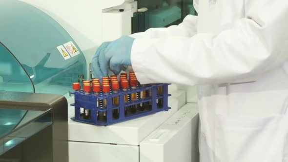 A Close-up of the Preparatory Process Before Placing the Tubes in a Laboratory Centrifuge