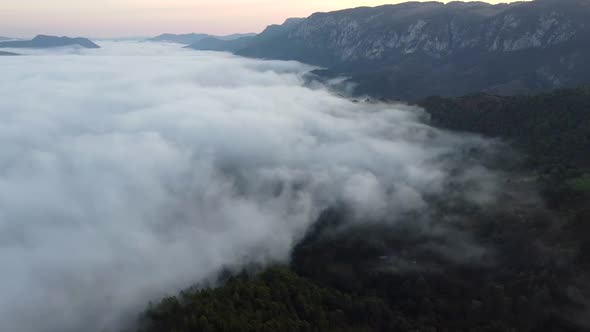 Clouds In Mountains Aerial View