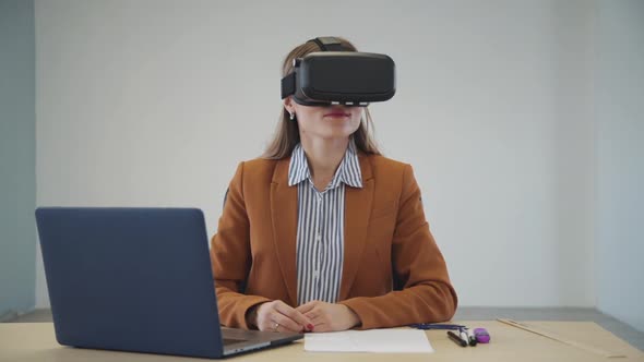 Woman in Virtual Reality Glasses Working in Cyber Space