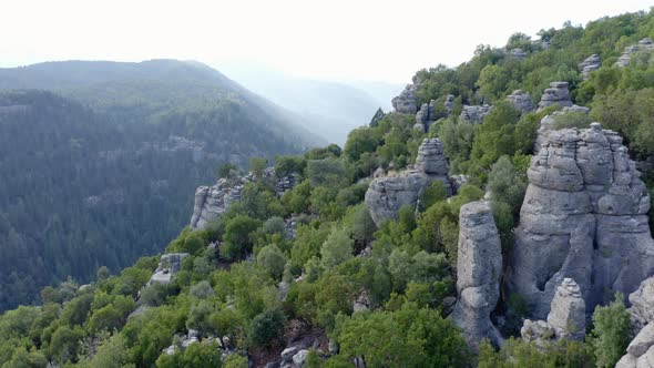 Majestic View of Unique Rock Formations on Mountains Slopes