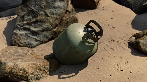 Old Cooking Gas Cylinder on Sand Beach