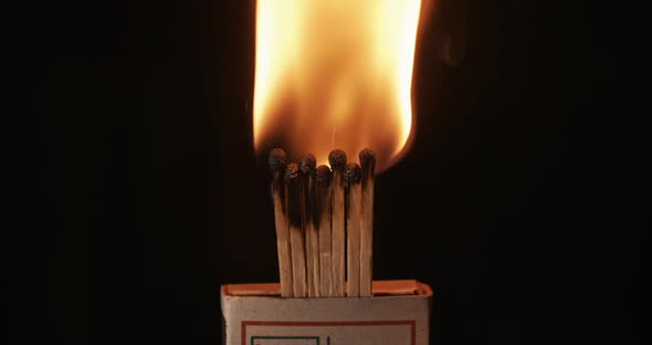 Matches Lighting at Dark Background in Slow Motion