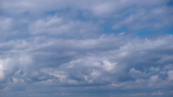 Cumulus Clouds Move in the Blue Sky Cloudscape Timelapse