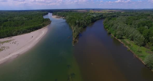 Aerial view of two different rivers merging into one