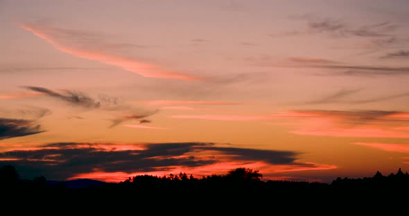 Amazing Sunset Sky Time Lapse with nice clouds. 4K sunset timelapse beautiful weather background lan