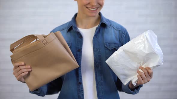 Girl Choosing Trendy Ecobag Instead Plastic Package, Pollution With Polyethylene