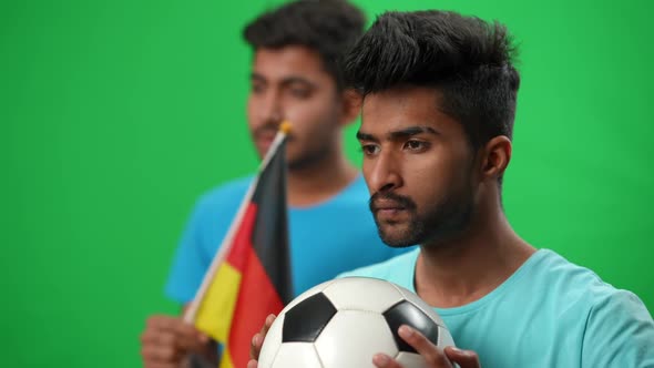 Focused Sport Fan Looking Away Throwing Away Ball Holding Head in Hands