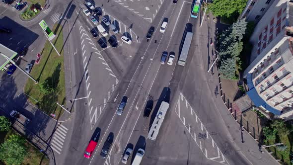 Drone Rises Above the Intersection of the Roads in a Suburb
