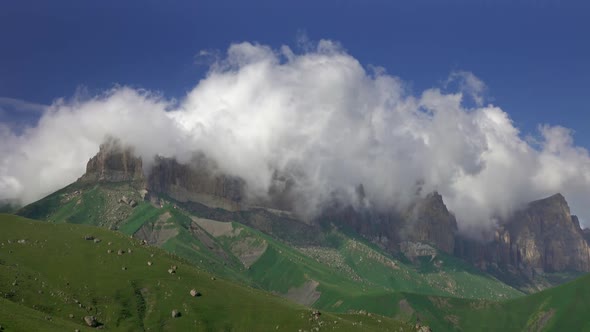 Caucasus Mountains Under Moving Clouds