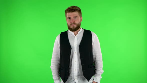 Man Is Offended and Looks Away. Green Screen