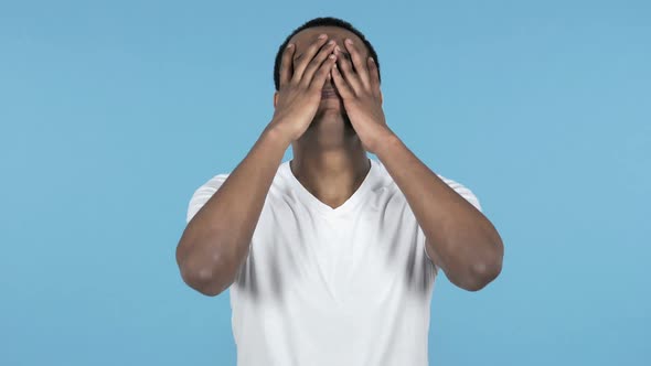 Young African Man Gesturing Failure and Problems Blue Background