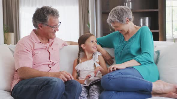 Grandparents and granddaughter spending time together