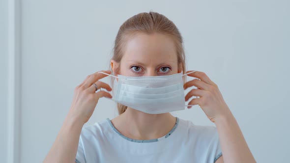 Woman with a Mask in Isolation for Virus Outbreak