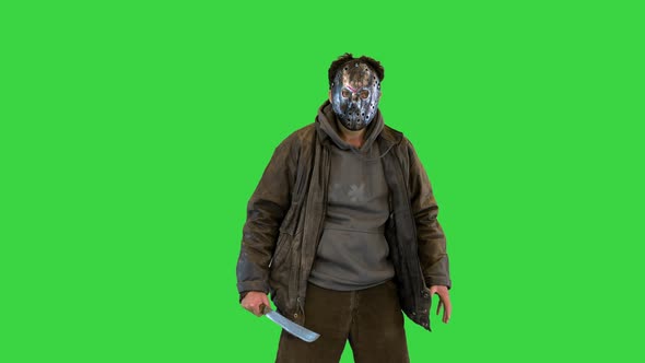 Jason Voorhees Looking at Camera and Waving Machete on a Green Screen Chroma Key