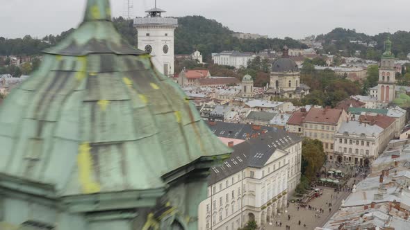 Aerial Drone Video of European City Lviv Ukraine Rynok Square Central Town Hall Dominican Church