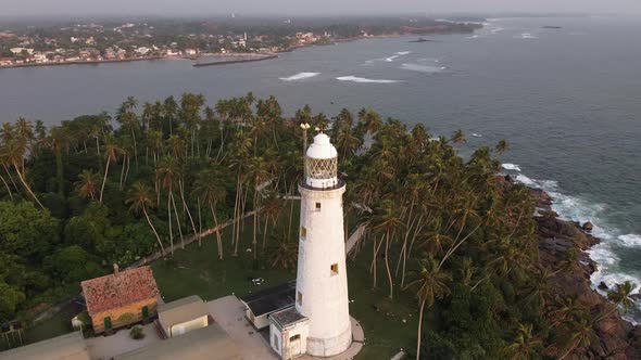 Aerial Drone View of the Old Lighthouse of White Stone Located on the Island