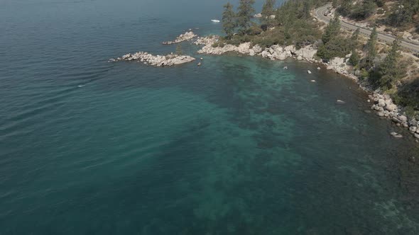 Rocks on the Crystal Clear Lake Aerial Footage