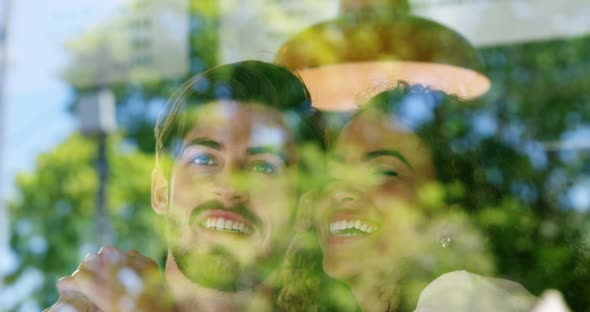 Couple embracing in restaurant