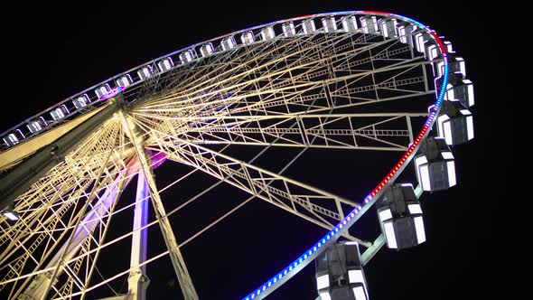 Huge Observation Wheel Stops Moving at Night Amusement Park, Entertainment