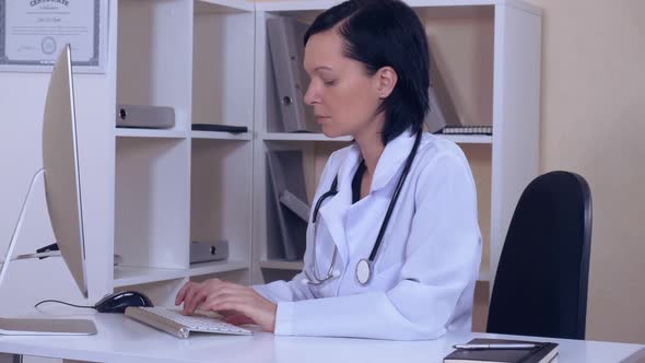 Therapist Works with Medical Records