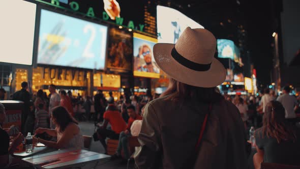 Attractive woman in Times Square in New York