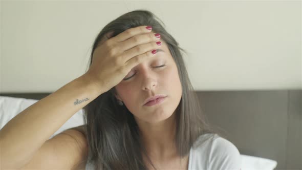 Woman suffering from headache