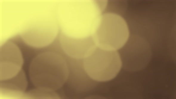 Gold Yellow Bokeh Particles Background