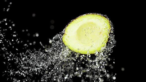 Slow Motion Fluid Splash Avocado