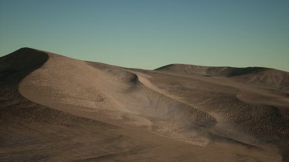 Aerial View on Big Sand Dunes in Sahara Desert at Sunrise