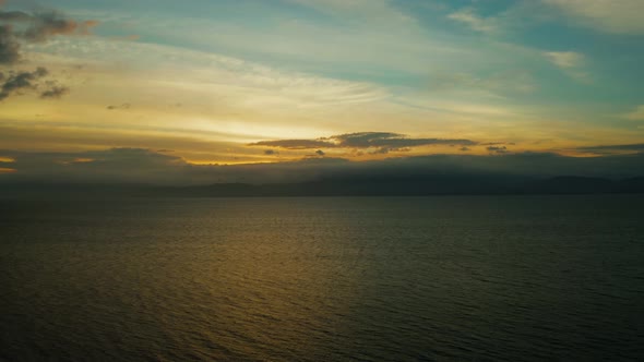 Cloudy Sky Over the Sea During Sunset