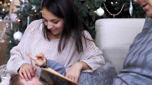 Family is Spending Time Together at Home in Christmas Eve