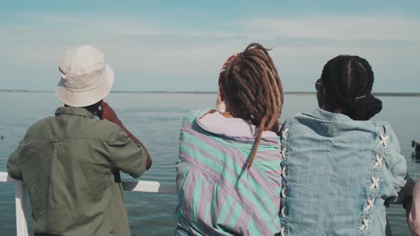 Diverse People Enjoying View from Pier