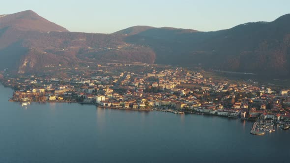 Arial shot of of Iseo city during sunset.Filmed on Dji Mavic pro 2 10 bit 4:2:2