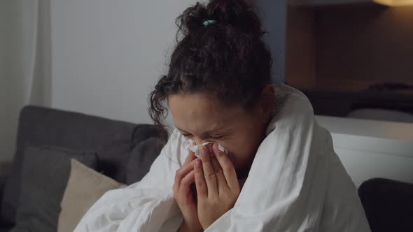 Sick Adult Woman Coughing Sneezing Blowing and Wiping Nose Indoors