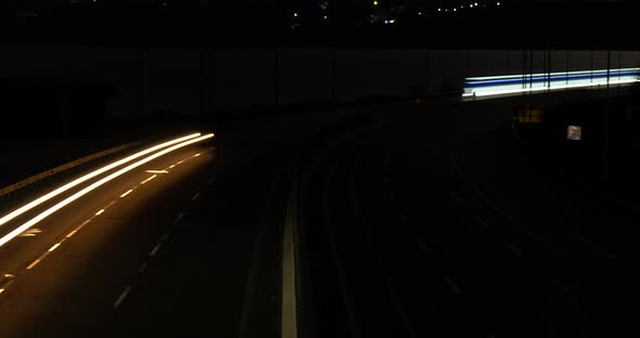 Road traffic lights in time lapse at night