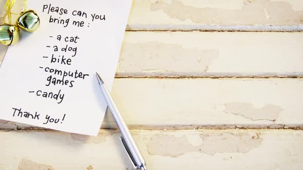 Letter to santa claus on a wooden plank