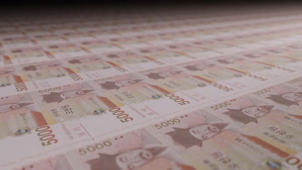 5000 South Korean won bills on money printing machine.