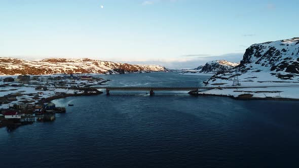 The Drone Flies Up to the Bridge in the Village of Teriberka the Filming Location of the Film