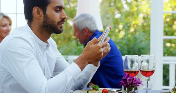 Man ignoring bored woman