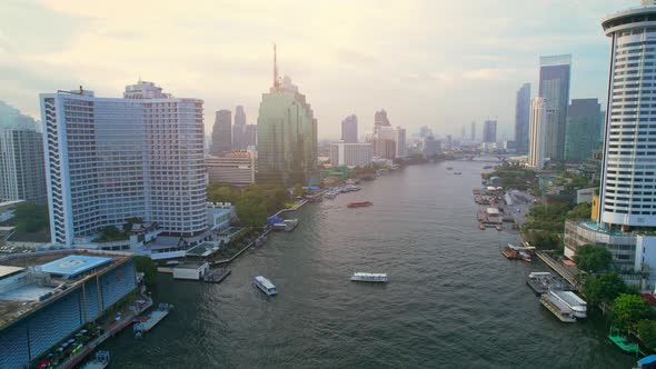 4K UHD : Aerial view over the Chao Phraya River and Buildings