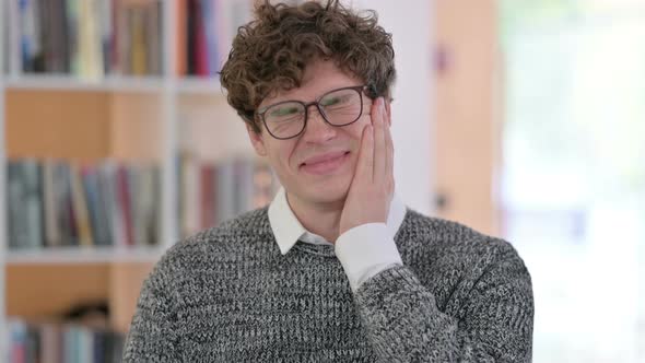 Portrait of Young Young Man with Toothache