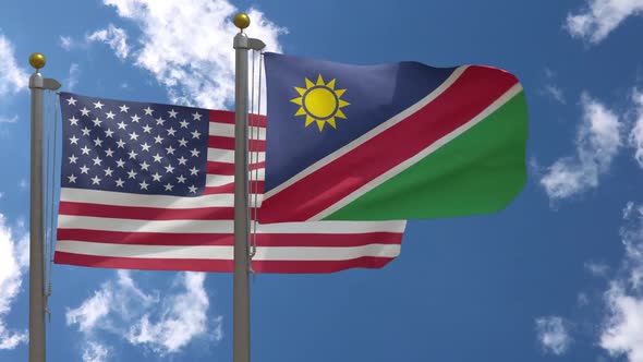 Usa Flag Vs Namibia Flag On Flagpole