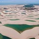 Drone Flying Backwards, Reveals A Portion Of Greenish Lagoons, In Northeastern Brazil - VideoHive Item for Sale