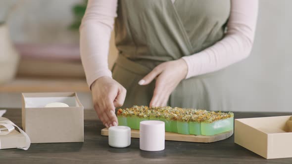 Woman Packing Natural Cosmetics In Gift Box