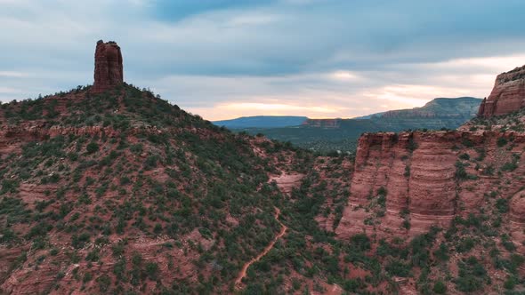 Flying Towards Red Rock Butte Formations With Lush Vegetations At Sedona In Central Arizona. Aerial